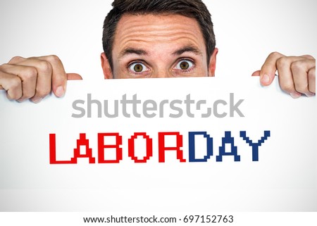 Man holding blank sheet  against labor day text 