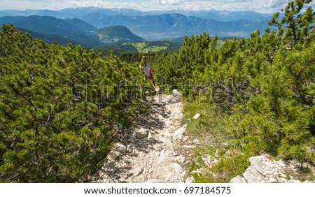 woman meditating relaxing alone Travel healthy lifestyle concept mountains sunny landscape on background outdoor. South Tyrol, Oclini Pass