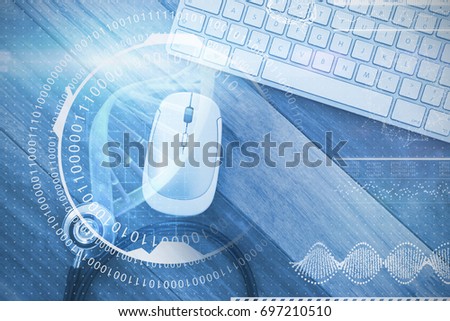 Digital image of DNA helix with numbers against overhead view of wireless computer mouse and keyboard with stethoscope 