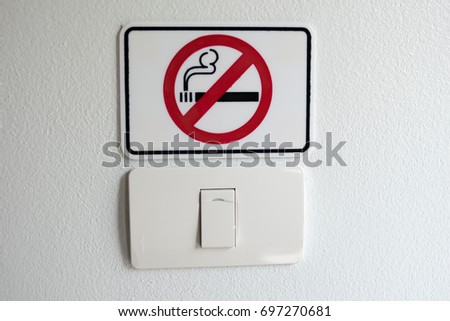 no smoking sign in hotel room