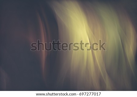 abstract background from tulle fabric in motion slow shutter speed