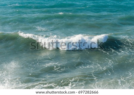 View on beautiful Waves of an turquoise Ocean