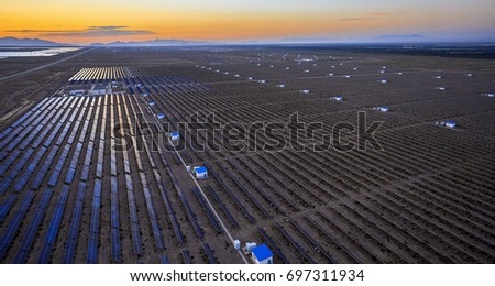 Aerial photography at sunrise when solar photovoltaic