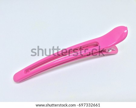 Shocking Pink Hair Clip Royalty-Free Stock Photo #697332661