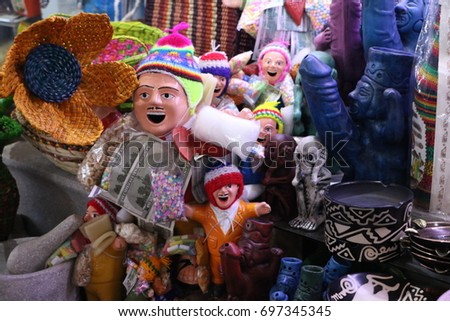 Mask and other kind of typical handcrafts in San Pedro Market, Cusco, Peru Royalty-Free Stock Photo #697345345