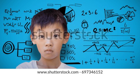 Portrait of shocked boy against blue background