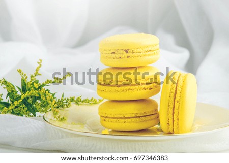 Yellow banana macarons. French delicate dessert for Breakfast in the morning light