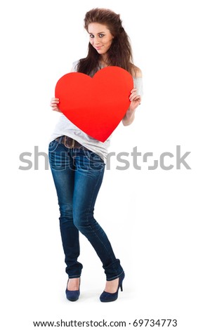 Young happy smiling woman with heart symbol, isolated