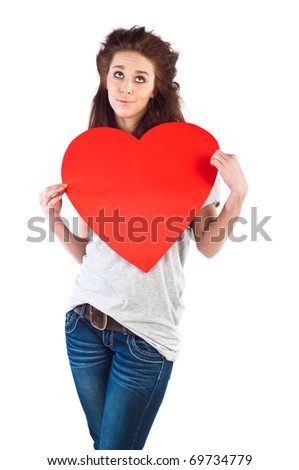 Young happy smiling woman with heart symbol, isolated