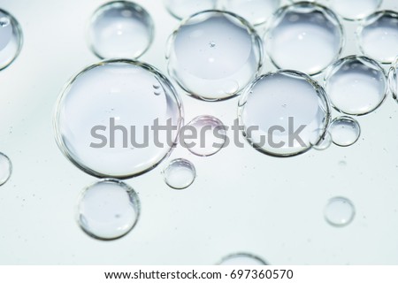 bubbles from oil abstract background , water Royalty-Free Stock Photo #697360570