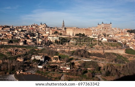 Panoramic photograph of the city of Toledo, Castilla La Mancha, Spain, with the Tagus River and its water mills surrounding the city. View of the streets 