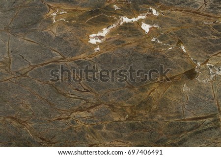 Rainforest Brown - marble randomly rugged dark brown and beige stripes. Marble texture for the 3D interior modeling. Natural material for tiles, countertops, window sills and decorative details.