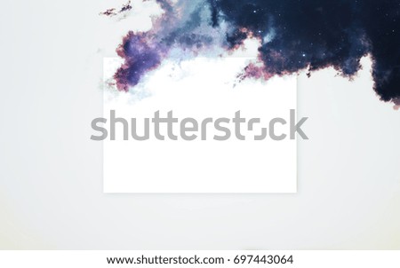 Creative layout made of nebula with paper card note. Elements of this image furnished by NASA