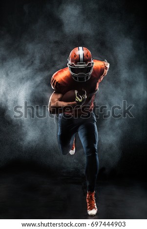 American football sportsman player running in action