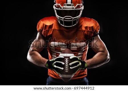 American football sportsman player on black background