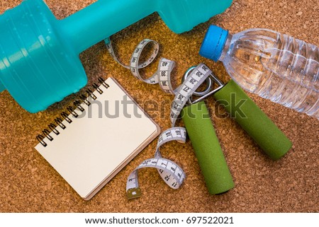 Lay Flat - Dumbbell,  Measuring Tape, Mineral Water & Blank Notebook for Motivational Quotes/Words - Fitness Concept