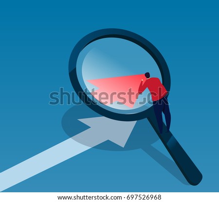 Businessman observes data with magnifying glass