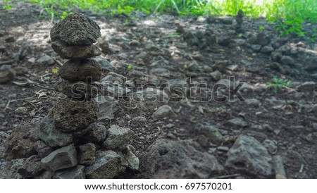Stones arranged in a vertical position.