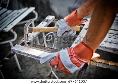 Construction Worker Using High Dynamic Range tone Royalty-Free Stock Photo #697641007