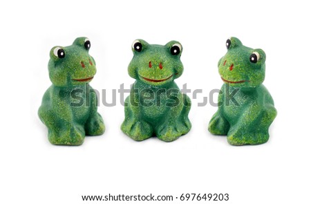 Figurine frog stock image. Frogs on a white background