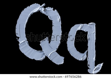 Alphabet.Oil paint.Letter Q on a black