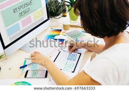 woman designing a responsive website