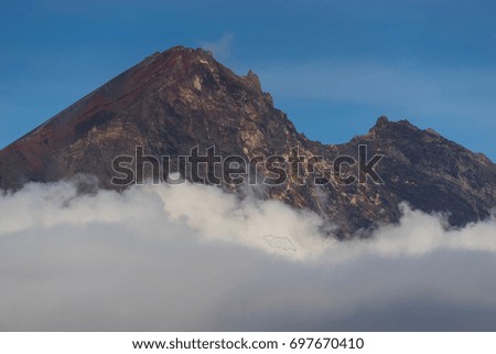 Rinjani volcano mountain peak above the cloud, Lombok island, Indonesia, Asia