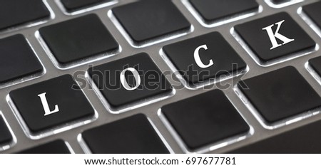 The white letter of Lock on computer keyboard background for design in your Presentation