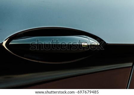 Generic modern pure minimalist design car door handle with keyless lock mechanism. Conceptual abstract background idea