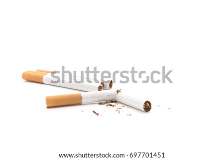Broken cigarette and tobacco isolated on white background