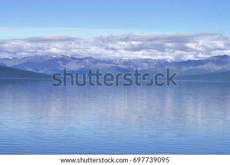 Glassy surface on Lake Khövsgöl (lake Khuvsgul) in Mongolia