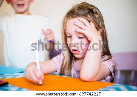 Child doing homework drawing creative art