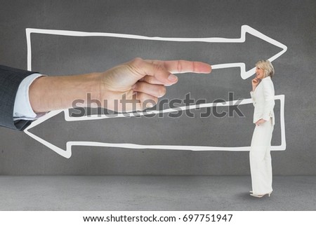 Digital composite of Hand pointing at business woman against grey background with arrows