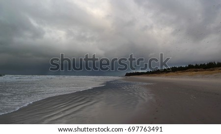 The dark cloud at the seaside