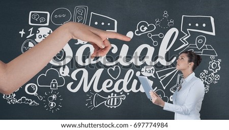 Digital composite of Hand pointing at business woman holding a tablet against blue background with social media icons