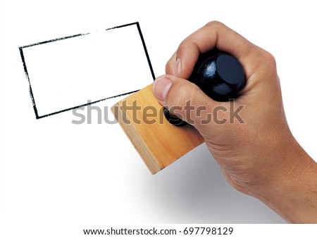 Hand stamping Royalty-Free Stock Photo #697798129