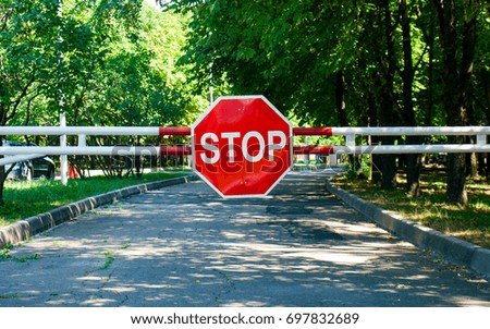 Stop sign in park.