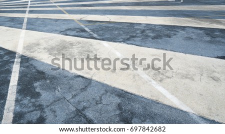 Close up asphalt road surface with white traffic strip