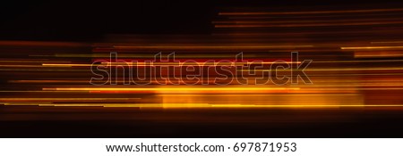 Red light trails Royalty-Free Stock Photo #697871953