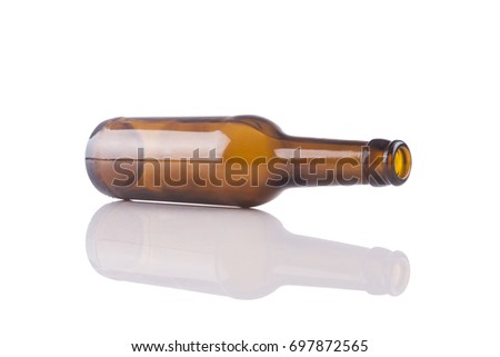 Bottle of beer isolated on white background with a relfection