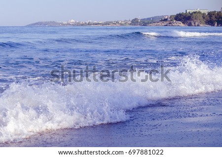 Scenic panoramic view of beautiful summer waves and beach at Avsalar, Alania, Turkey, Mediterranean sea. Copy space.