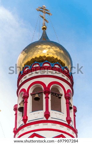 The bell tower of the Orthodox Church on sky background