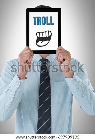 Digital composite of Troll text with cartoon mouth on tablet over mans face