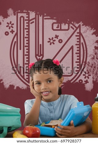 Digital composite of Student girl at table against red blackboard with education and school graphic