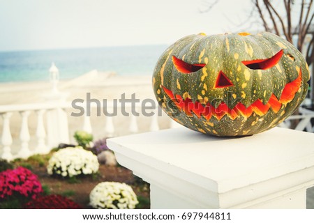 Helloween pumpkin decoration. Helloween party. Helooween celebration attributes.