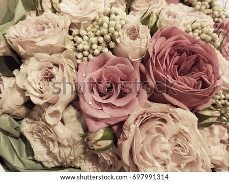 Atmospheric background with a refined flower arrangement. Focus selective, the image is tinted, blur effect