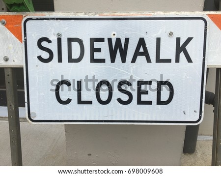 Sidewalk close sign