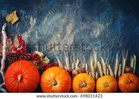 A table decorated with pumpkins, Harvest Festival,Happy Thanksgiving.
