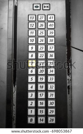 Old buttons of elevator control panel. / Number button in elevator. / Elevator Floor No.7 ( photography by mobile ) Royalty-Free Stock Photo #698053867