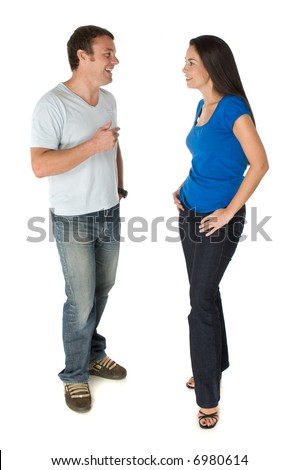 A man and woman standing together talking on white background Royalty-Free Stock Photo #6980614